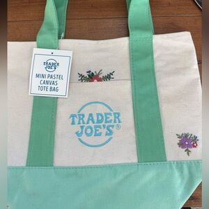 Trader Joe’s mini tote bag. Green and custom had embroidering